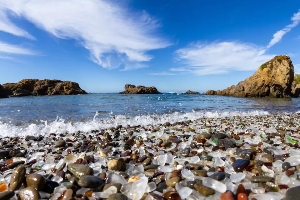 Close-up of rounded weathered multicolored glass pieces on Glass Beach in Fort Bragg, California.